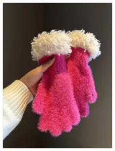 Detail view of plush fuzzy gloves with white fluffy cuffs, warm winter handwear accessory.