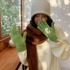 Cozy winter knit touchscreen gloves for women, cute green warm gloves with letter C.