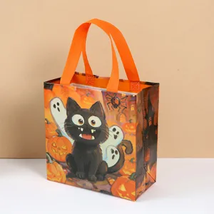 Halloween non-woven candy gift bag featuring cute black cat and pumpkin cartoon design.