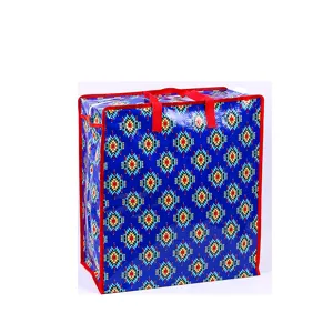 Bolsa de almacenamiento tejida impermeable detalle, con patrón geométrico étnico y cremallera roja.