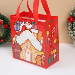Red Christmas non-woven tote bag featuring cute gingerbread house and Santa design for holiday gifts
