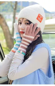 Cozy winter knitted striped warm gloves for women, long fingerless touch screen design.