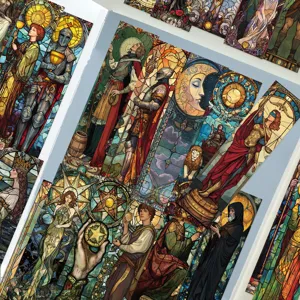 Detailed view of medieval stained glass tarot card bookmarks, featuring intricate art designs.