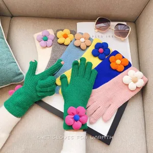 Women winter knit touch screen gloves with cute 3D flower decoration, warm and cozy for cold days.