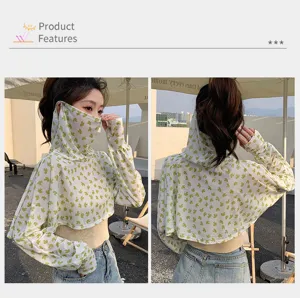 Sun protection shawl sleeves face cover detail view, lightweight breathable fabric green print.