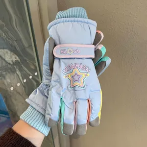 Close up of winter ski gloves details, fleece lined warm anti slip palm touch screen.