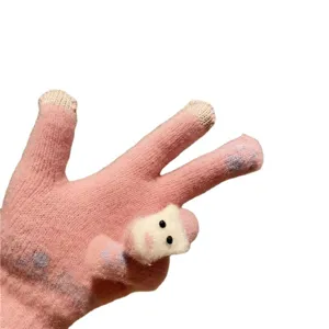 Cute winter knit touch screen gloves for women with pink plush bear decor and warm fleece lining.