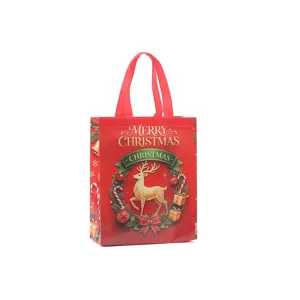 Christmas non-woven tote bag with golden reindeer print, festive holiday gift shopping bag.