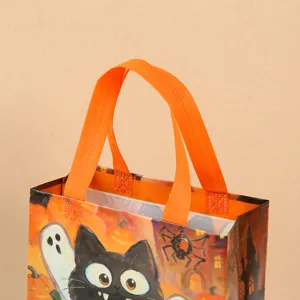 Close-up detail of Halloween non-woven candy gift bag featuring cute black cat and ghost print.