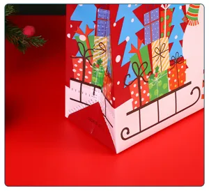 Weihnachts Vlies Geschenktüte Detailansicht mit festlichem Schneemann und Verpackung.