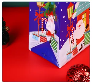 Christmas non-woven gift bag with Santa Claus and tree pattern, durable and festive shopping bag.
