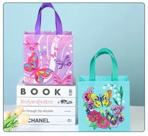 Butterfly non-woven gift bag, stylish reusable shopping bag, ideal for holiday packaging and storage.