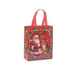 Bolsa de regalo navideña roja de tela no tejida con Papá Noel y reno para fiestas.