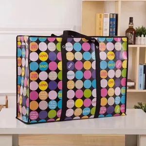 Large storage bag waterproof moving packing bag with colorful polka dots and handles.