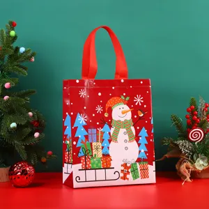 Festliche Weihnachtstasche aus Vliesstoff mit süßem Schneemann-Druck für Geschenke und Deko.