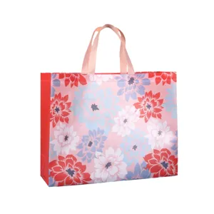 Bolsa de compras reutilizable floral de moda con asas resistentes para uso diario y regalos.