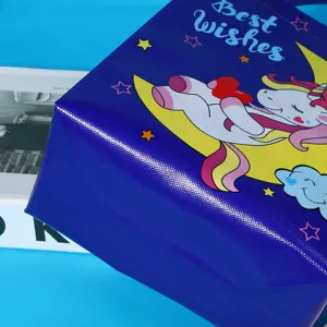 Waterproof non-woven cartoon unicorn gift bag with handles for clothing shopping and parties.
