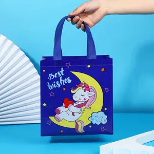 Detailed view of cute cartoon unicorn non-woven gift tote bag for party packaging and clothing.