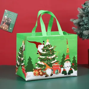 Large Christmas non-woven gift bag shopping bag with festive gnome and tree print design.