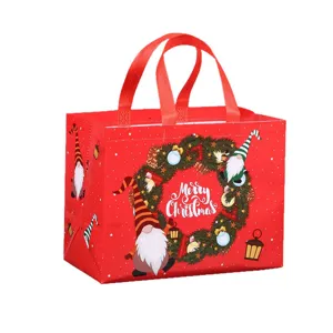 Large red non-woven Christmas shopping bag, eco-friendly festive gift tote for holidays.