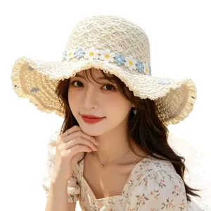 Fashion floral straw sun hat for women, wide brim beach hat for summer outdoor UV protection.