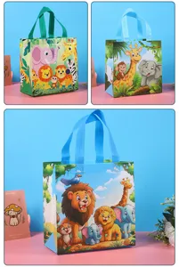 Cute jungle animal gift bags with lion giraffe elephant design for kids party packaging.