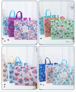 Large floral non-woven waterproof storage bag, portable tote for bedding and clothing gifts.