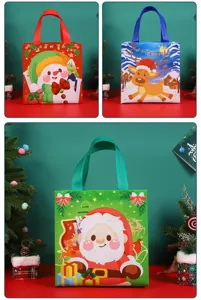 Christmas non-woven gift bag detail view, featuring cute cartoon Santa, snowman and reindeer designs.