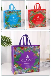 Detailed view of laminated non-woven shopping bags with floral pattern and classic text.