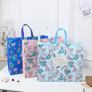 Large waterproof non-woven storage shopping handbag with elegant floral print design for travel