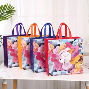 Colorful waterproof non-woven laminated tote shopping bags with floral print, 4-piece set.