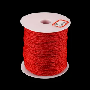 Cordon en nylon rouge sur bobine blanche, 1mm d'épaisseur 100 mètres pour bracelets et bijoux.