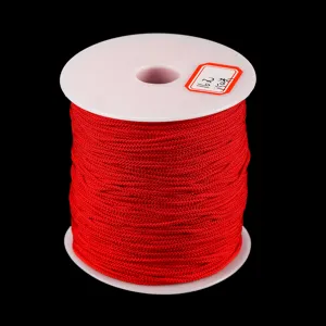 Cordelette fil rouge sur bobine blanche 150m pour bijoux artisanaux et accessoires DIY.