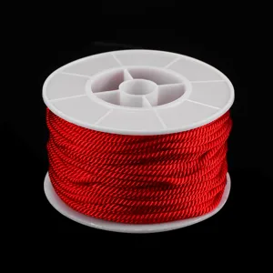 Bobine de cordon en nylon rouge pour fabrication de bijoux faits main et accessoires DIY.