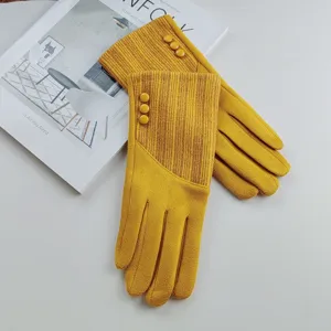 Yellow faux suede warm touchscreen gloves with chic knit striped cuffs and button detail.