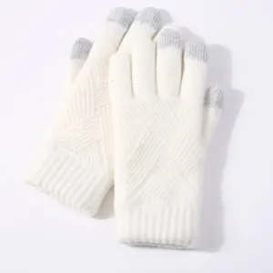 White winter knitted touchscreen gloves with grey fingertips, warm thermal knit detail view.