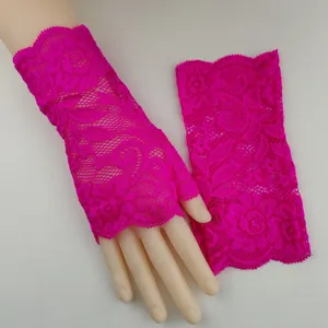 Hot pink lace fingerless gloves, short hollow floral arm sleeves for fashion performance.