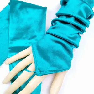 Turquoise satin long fingerless gloves detail shot, showcasing smooth shiny fabric.