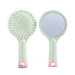 Mini 2-in-1 hair brush with mirror, cute pink airbag massage comb for daily use detail view.