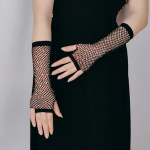 Black mesh rhinestone fingerless gloves detail shot, sparkling festival rave party wear.