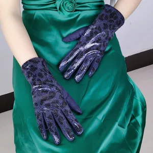 Detail view of women autumn winter warm windproof touch screen animal print gloves closeup
