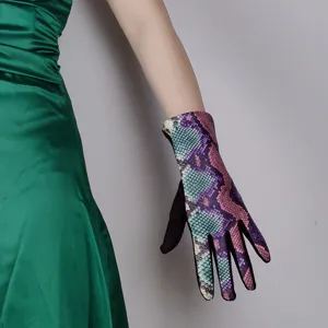 Close-up of women's colorful snakeskin pattern touchscreen detail glove texture showcase.