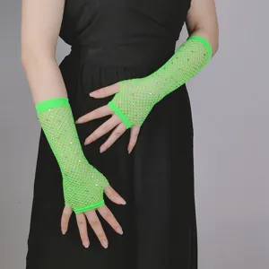 Neon green fishnet fingerless gloves with rhinestones for rave party and clubbing festival.