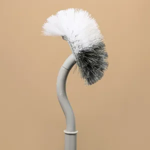 Brosse de toilette domestique créative à long manche courbé pour le nettoyage de salle de bain.