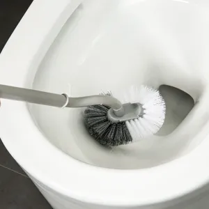 Brosse de toilette ménagère à long manche et poils souples pour un nettoyage efficace.