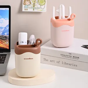 Cute plastic multi-functional desktop pen holder with heart handle for neat office organization.