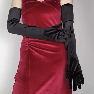 Detail view of the elegant black velvet long gloves, showcasing soft texture and vintage style.