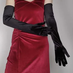 Black velvet long gloves detail view, elegant opera evening party vintage costume accessory.