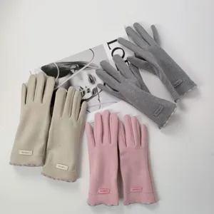Detailed view of women winter thermal fleece touch screen gloves in multiple cozy colors.