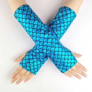 Detailed view of the iridescent blue mermaid scale fingerless gloves for cosplay performance.